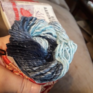 Ball of ombre blue yarn